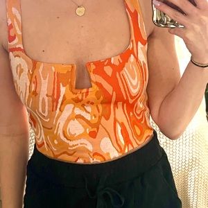 Retro 80's vibe orange abstract print knit jacquard tank with square notch.